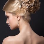 beautiful-blond-girl-with-perfect-skin-evening-make-up-wedding-hairstyle-and-accessories-.jpg